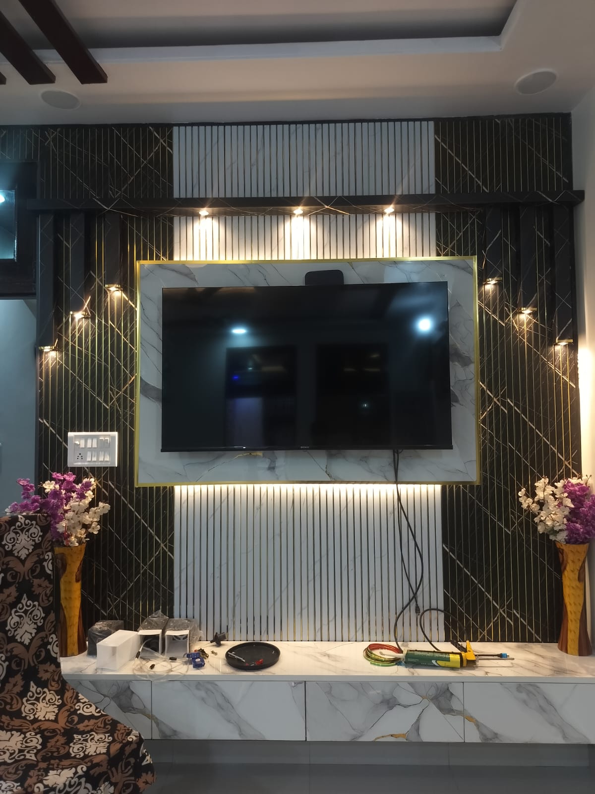 PVC fluted TV unit wall finish and interior detailing